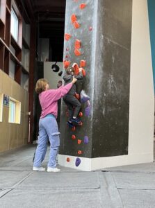 Eli on rock wall