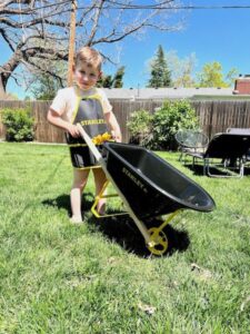 Eli with a wheelbarrow